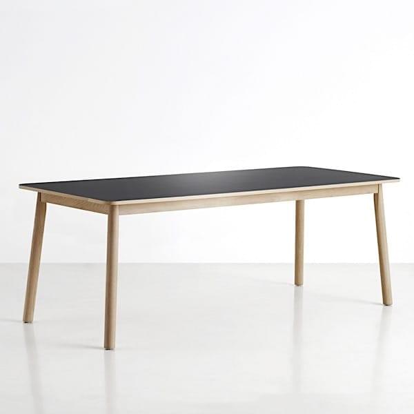 The dining table PAUSE , constructed in solid wood, is generous and ...